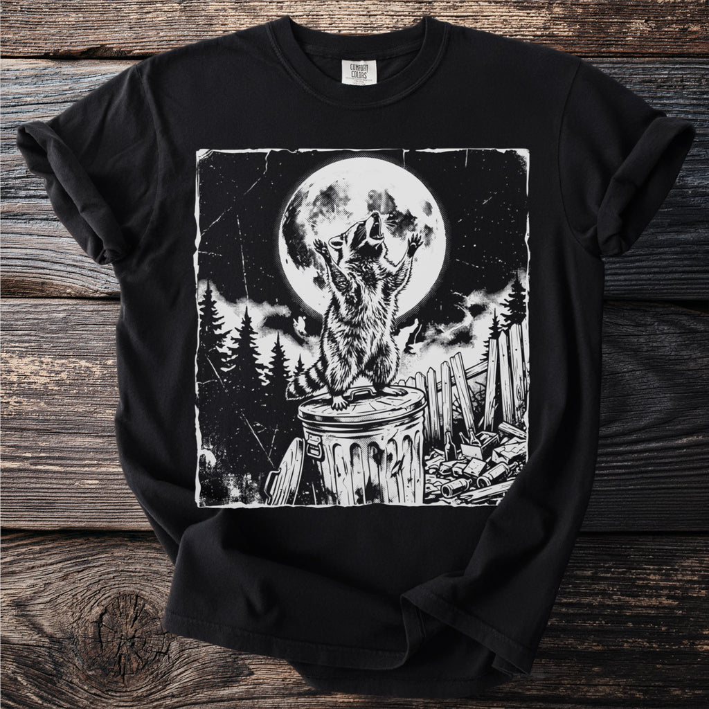 Black t-shirt with a graphic of a raccoon howling at the moon.