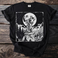 Black t-shirt with a graphic of a raccoon howling at the moon.