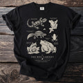 Black t-shirt featuring vintage illustrations of amphibians and salamanders with text labels.