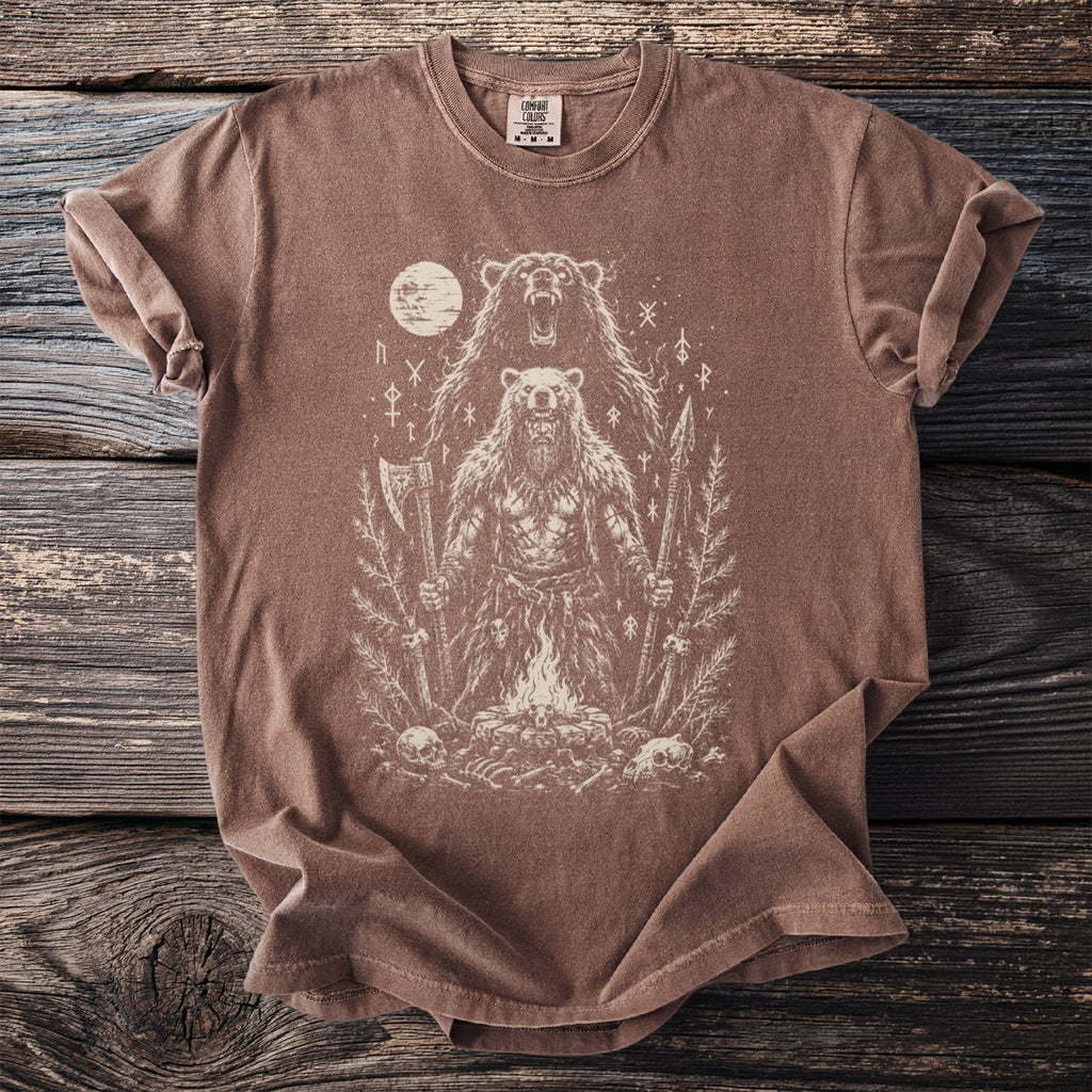 Brown t-shirt with a white graphic of a Viking bear warrior beside a campfire.