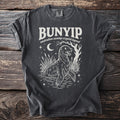 Bunyip Australian swamp cryptid legend graphic on charcoal t-shirt with moon and stars.