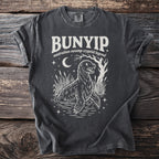 Bunyip Australian swamp cryptid legend graphic on charcoal t-shirt with moon and stars.