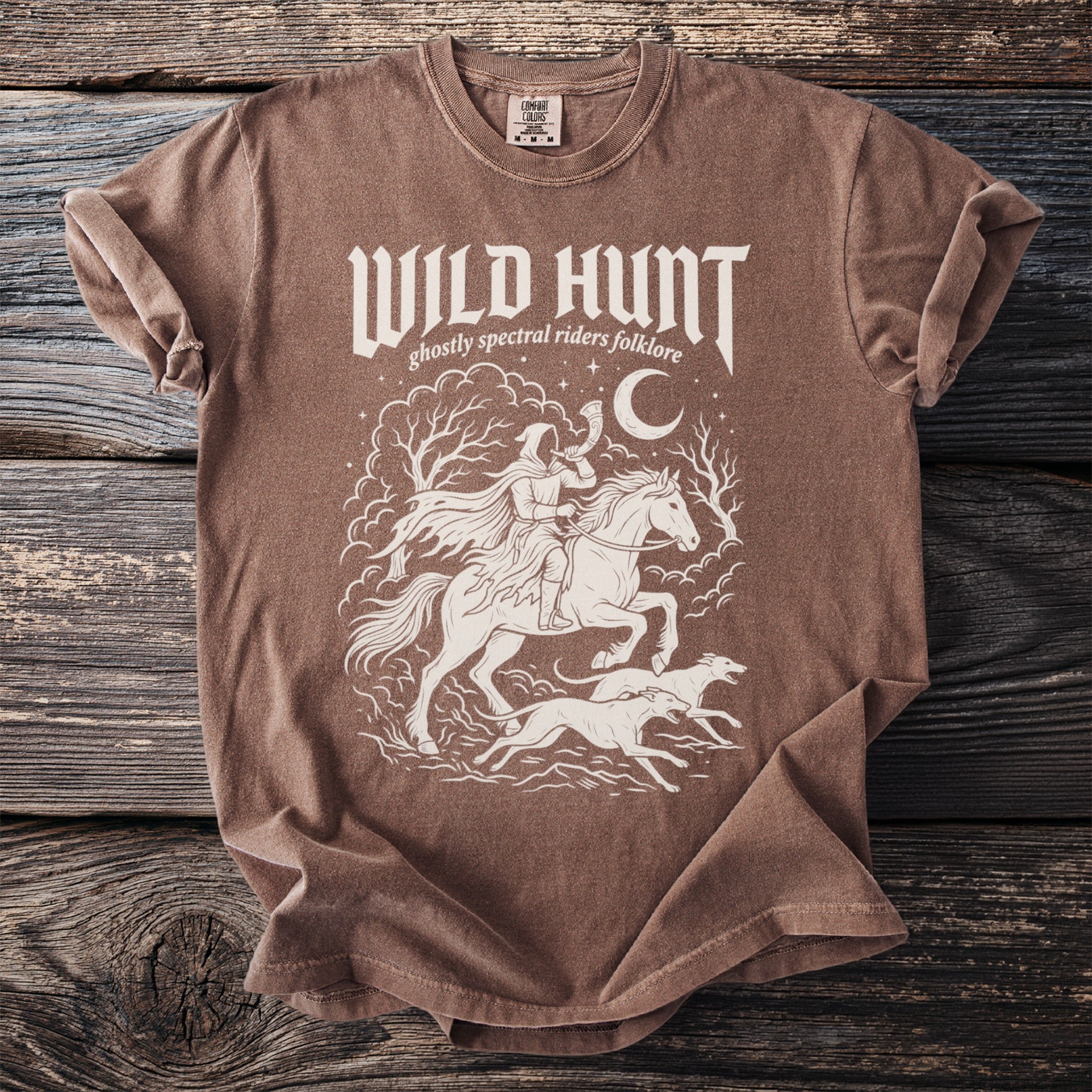 Brown t-shirt with "Wild Hunt ghostly spectral riders folklore" text and graphic.