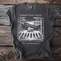 Dark grey t-shirt with black and white drawing: "annual crow census they are counting too".