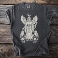 Dark grey t-shirt with angelic figure, moon, owls, snake, and floral design.