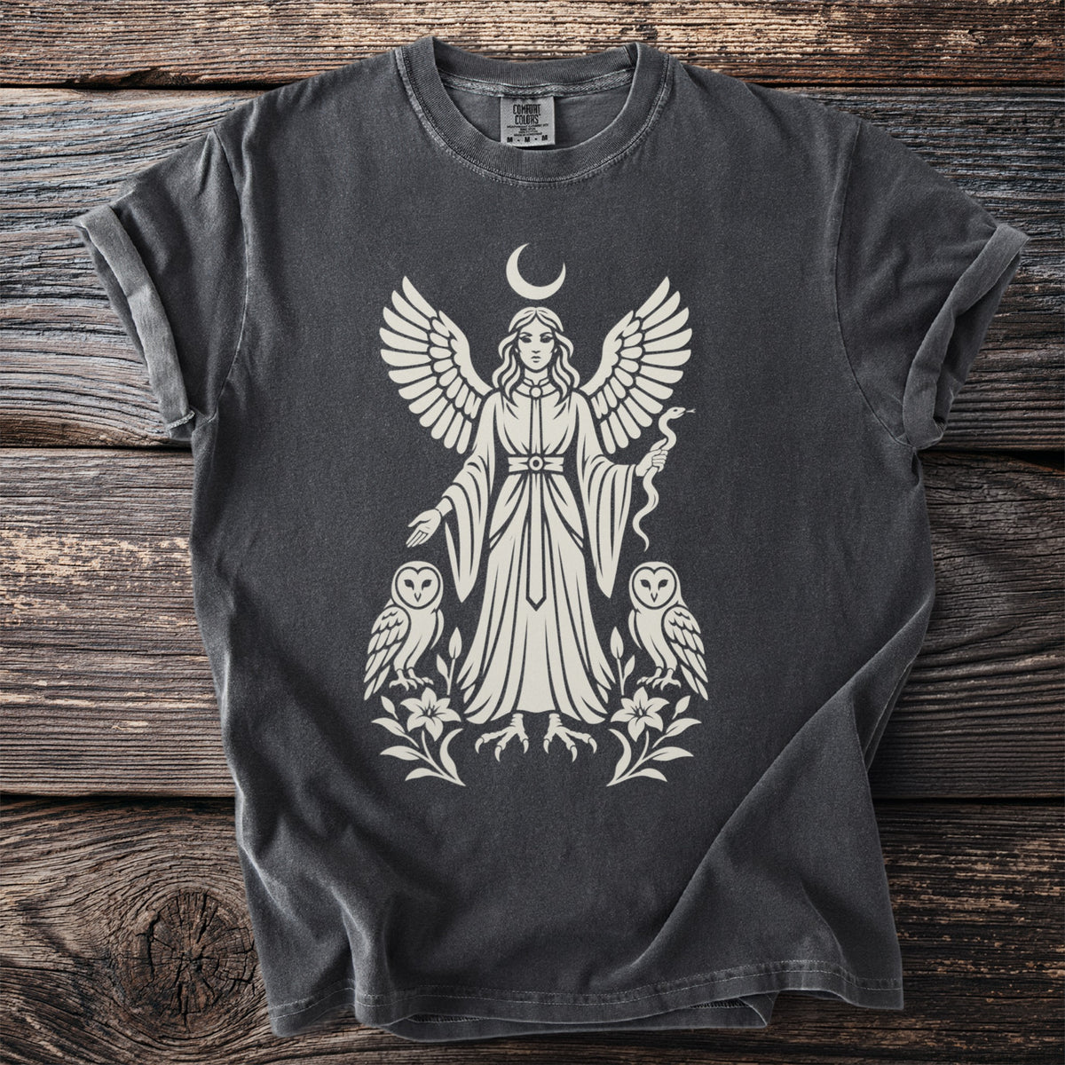 Dark grey t-shirt with angelic figure, moon, owls, snake, and floral design.