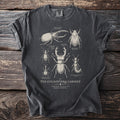 T-shirt with scientific illustrations of beetles labeled "The Coleoptera Cabinet".