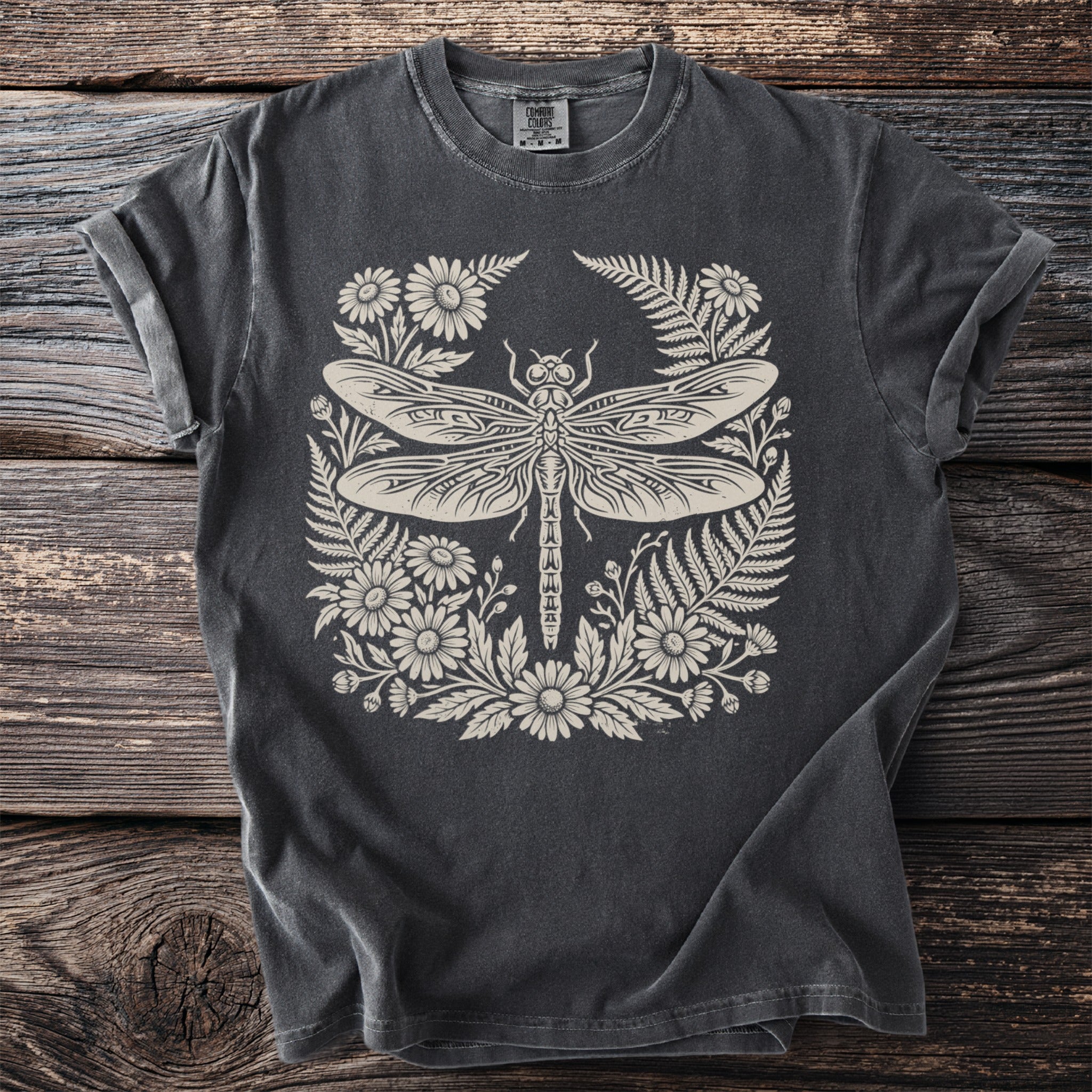 Dark grey t-shirt with a cream dragonfly and floral design.