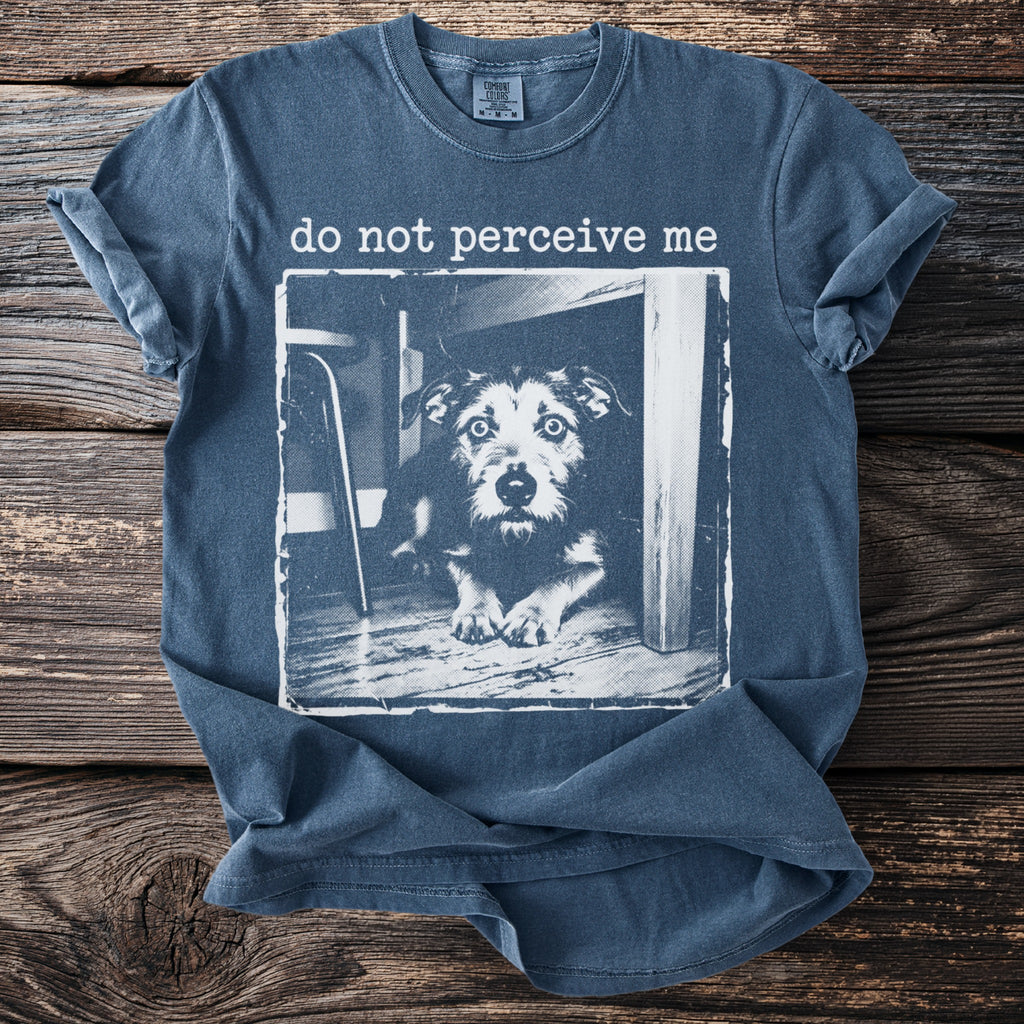 Blue t-shirt with "do not perceive me" text and a dog portrait graphic.