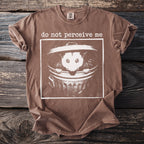 Brown t-shirt with graphic of an opossum in a trash can and text "do not perceive me".