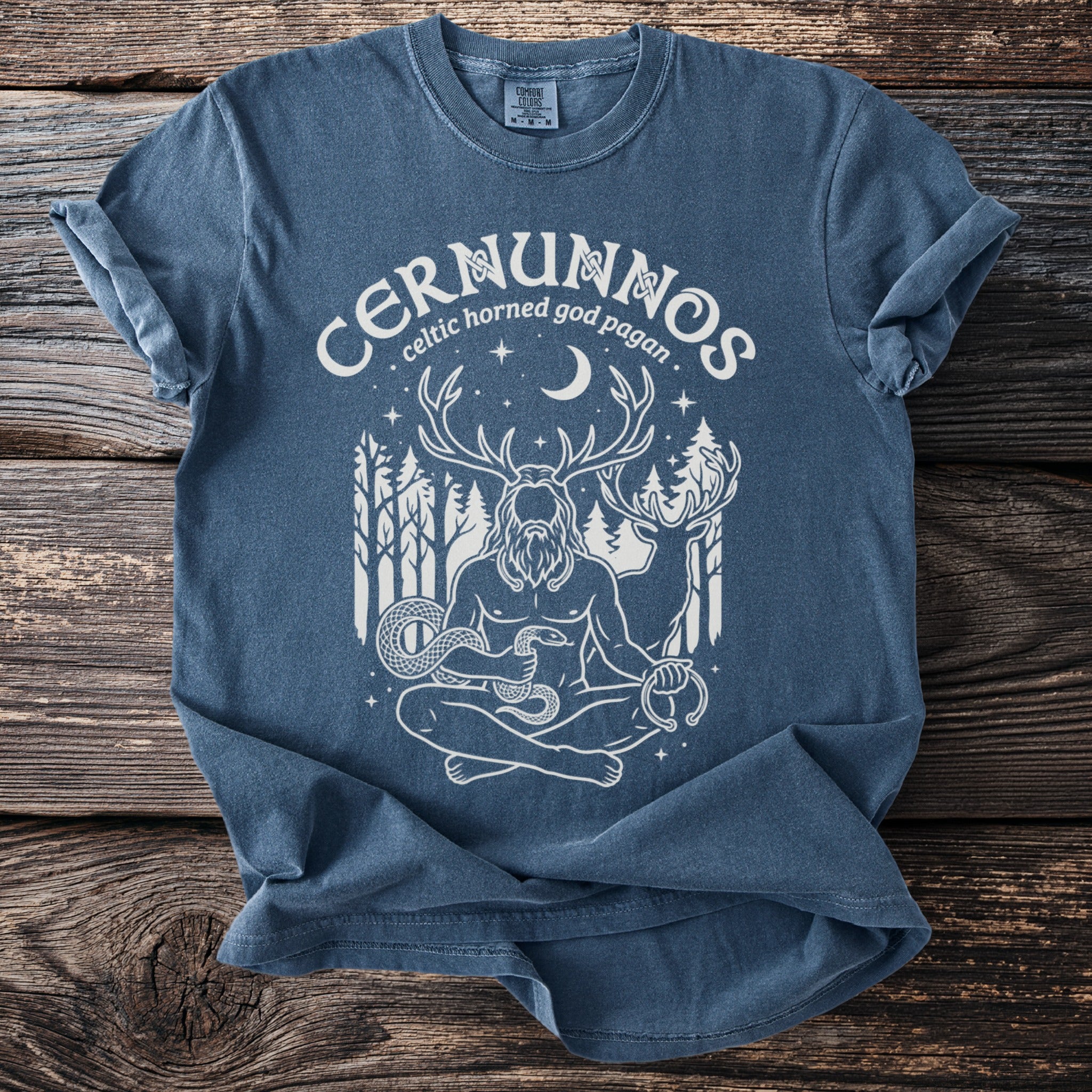 Cernunnos Celtic horned god pagan graphic tee with forest and moon design.