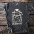 Dark t-shirt with Egyptian cat design and sun symbol.