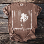 Brown t-shirt with a distressed print of a shaggy dog's face and the text "please do not perceive me".