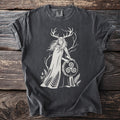 Dark grey t-shirt with white print of a woman with antlers holding a triskelion shield.