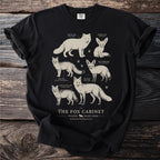 Black t-shirt with various fox species and scientific names, "The Fox Cabinet" text.