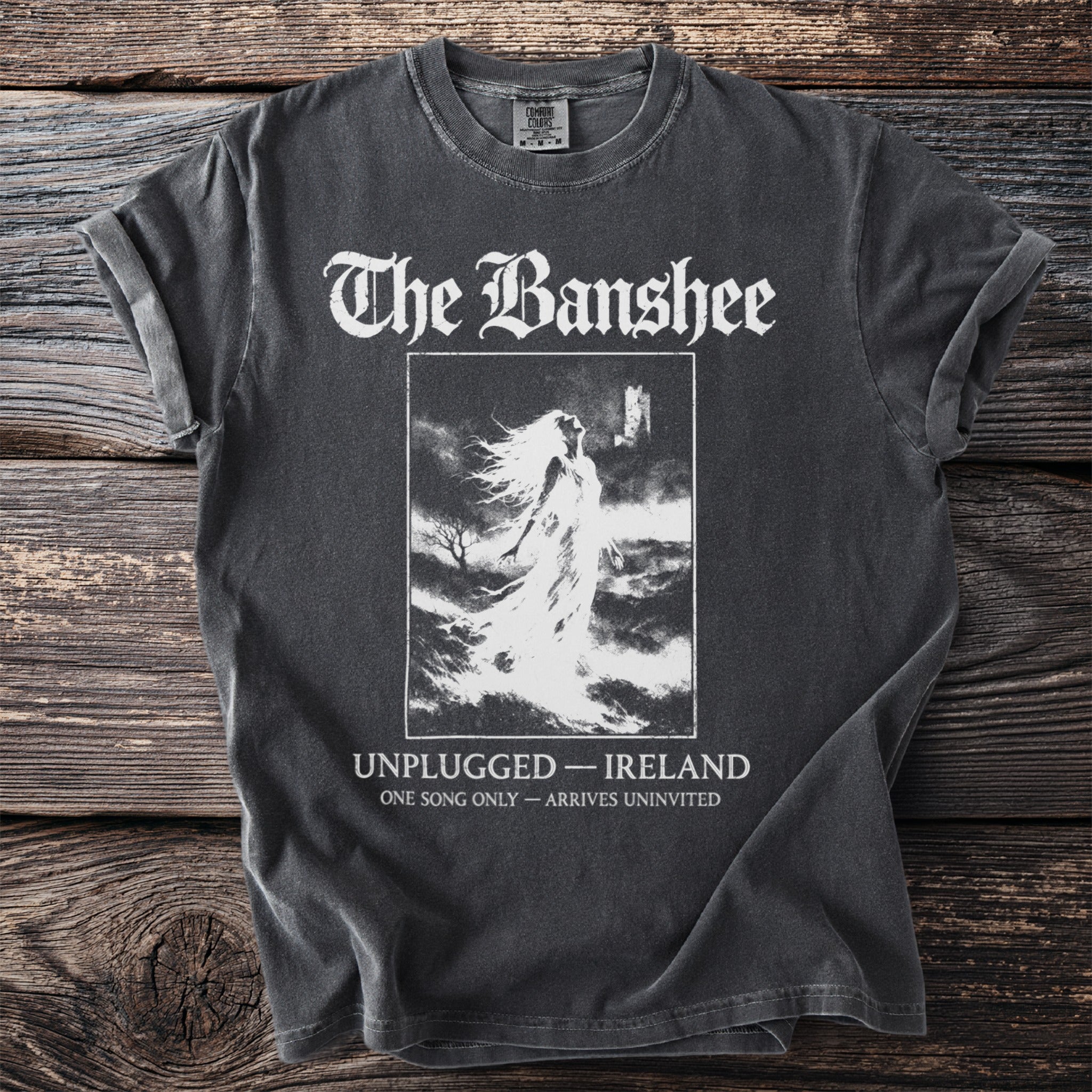 Dark gray t-shirt with "The Banshee" text and a graphic of a ghostly figure.
