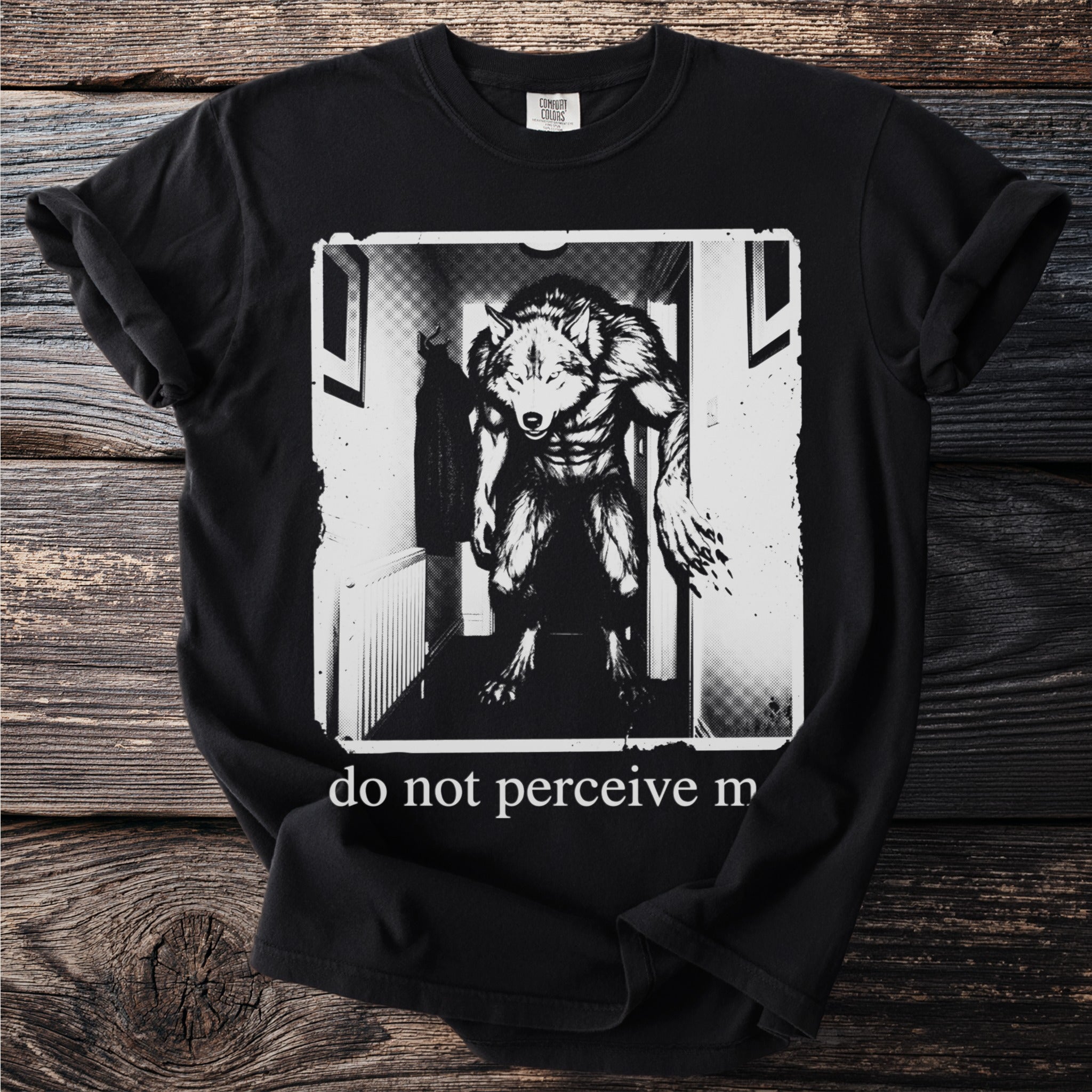 Black t-shirt with werewolf graphic and text "do not perceive m".