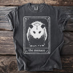 Gray t-shirt with a graphic of a possum in a tarot card design titled "the menace".
