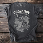 Dark grey t-shirt with white graphic of a frog-like creature with long beard and a water wheel.