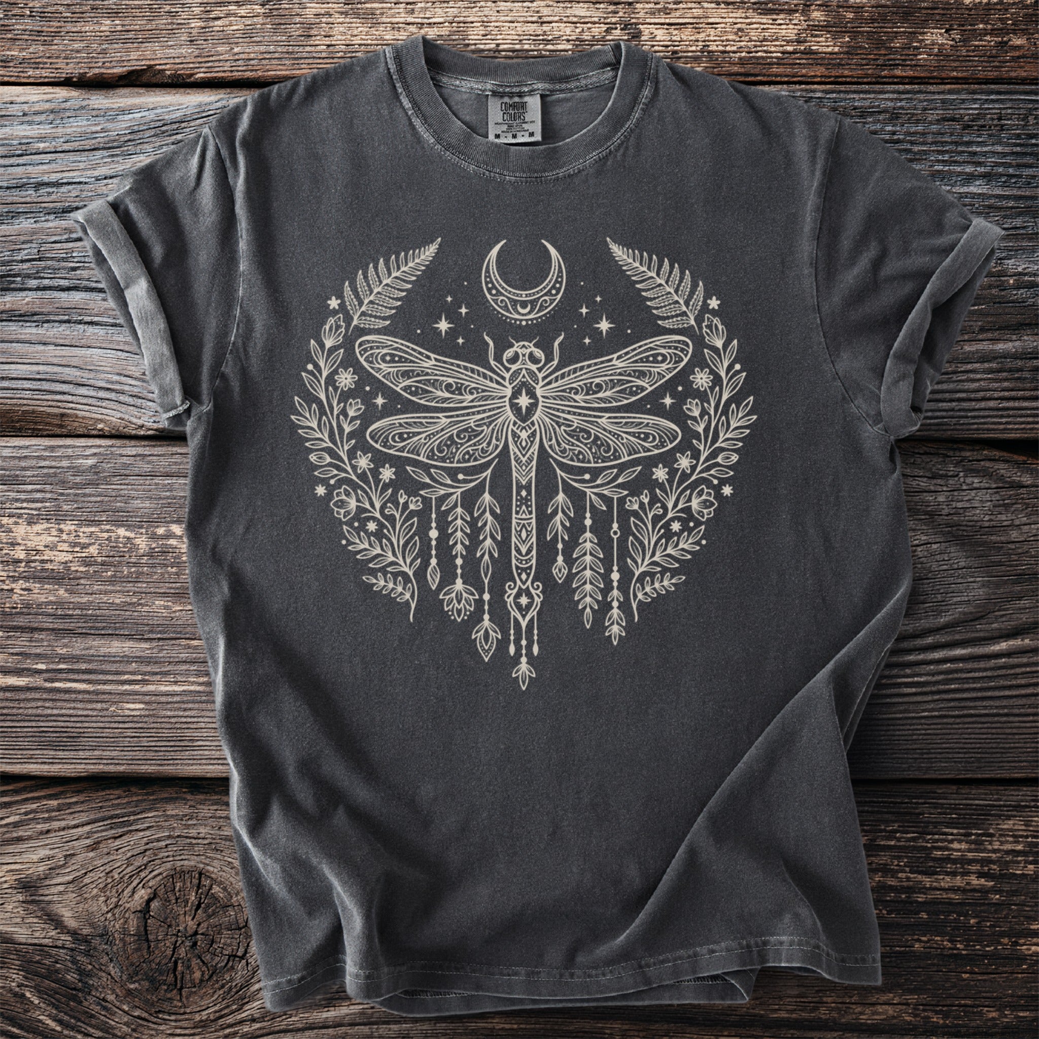 Charcoal t-shirt with a cream dragonfly and floral moon design.