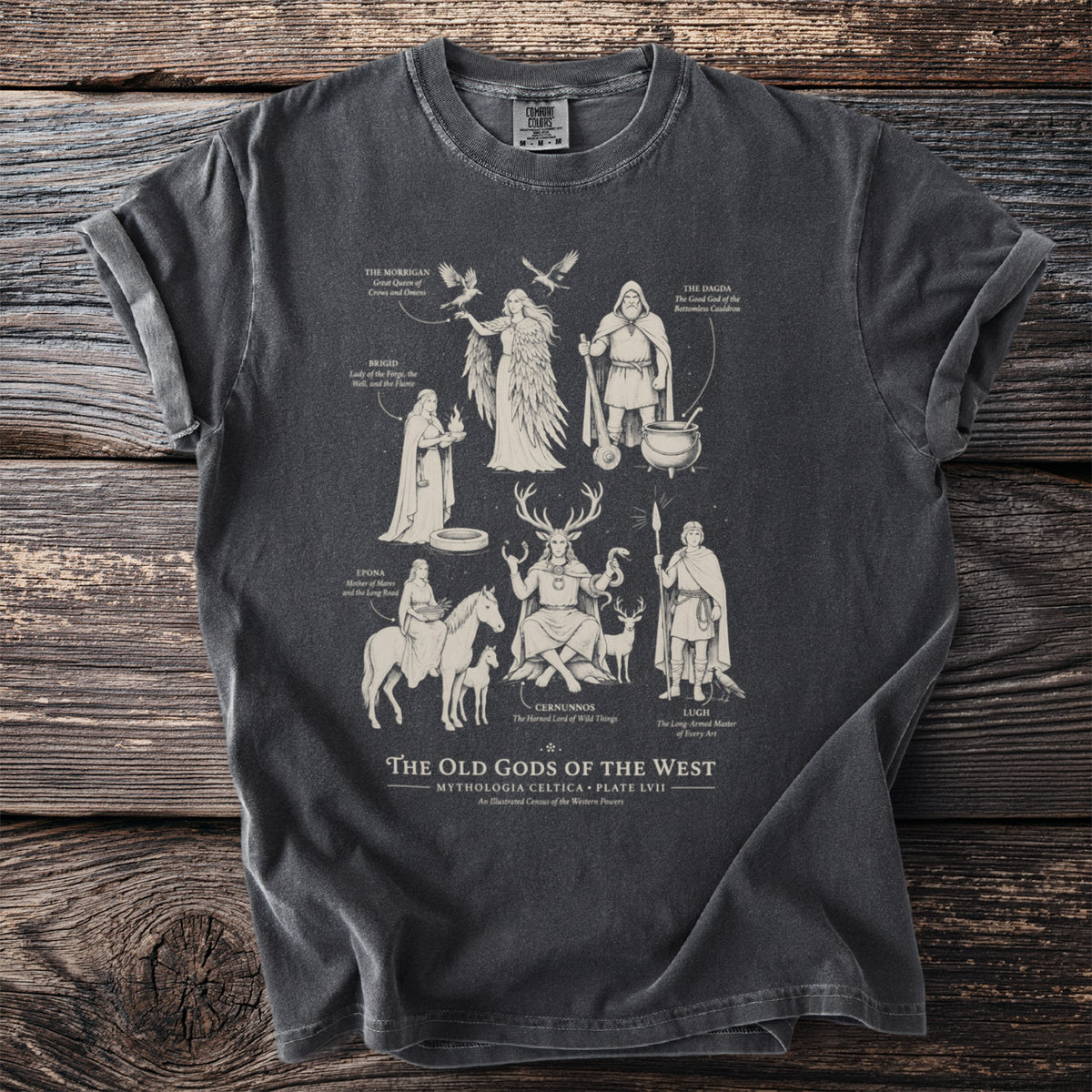 Dark t-shirt with cream-colored line art of Celtic gods and text.