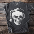Dark gray t-shirt with white skull graphic wearing a Santa hat.