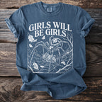 Blue t-shirt with white graphic of spider and text "GIRLS WILL BE GIRLS".