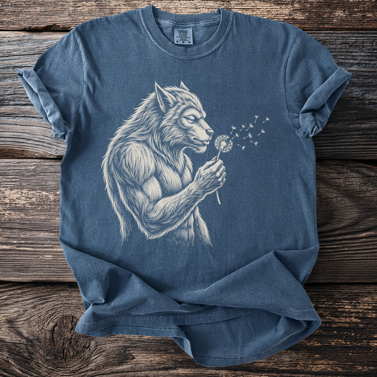Werewolf blowing on a dandelion with seeds blowing away, Comfort Colors t-shirt.