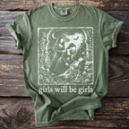 Green t-shirt with a gothic illustration and text "girls will be girls"