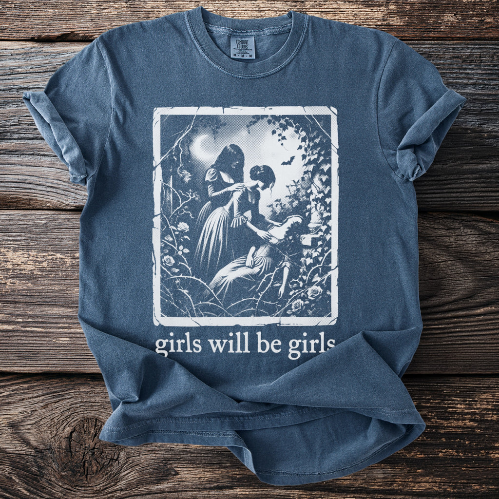 Blue t-shirt with "girls will be girls" text and a vintage illustration.