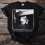 Black t-shirt with a distressed graphic of a rabbit and text reading "i was not made to be perceive".