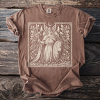 Brown t-shirt with a cream linocut style print of a winged warrior with a spear and shield.