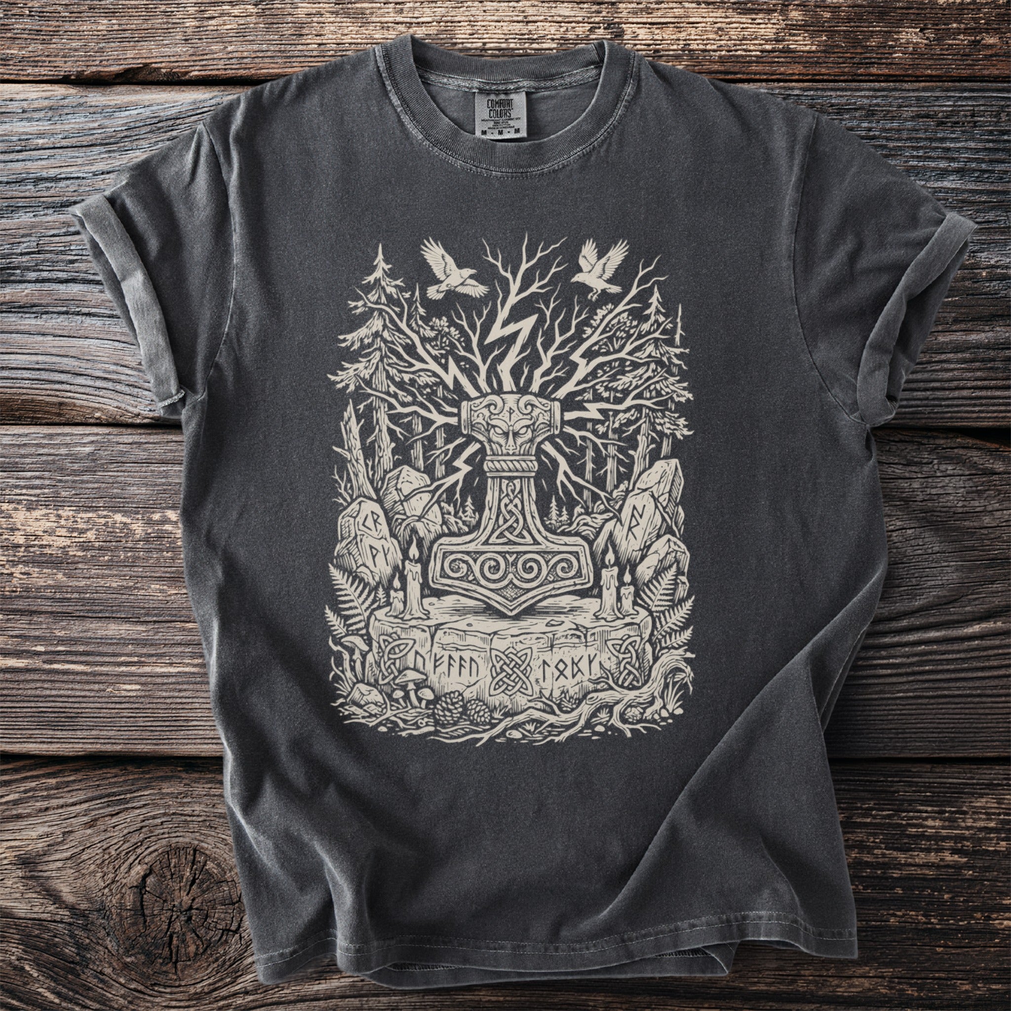 Dark grey t-shirt with Thor's Hammer, trees, and runes graphic.