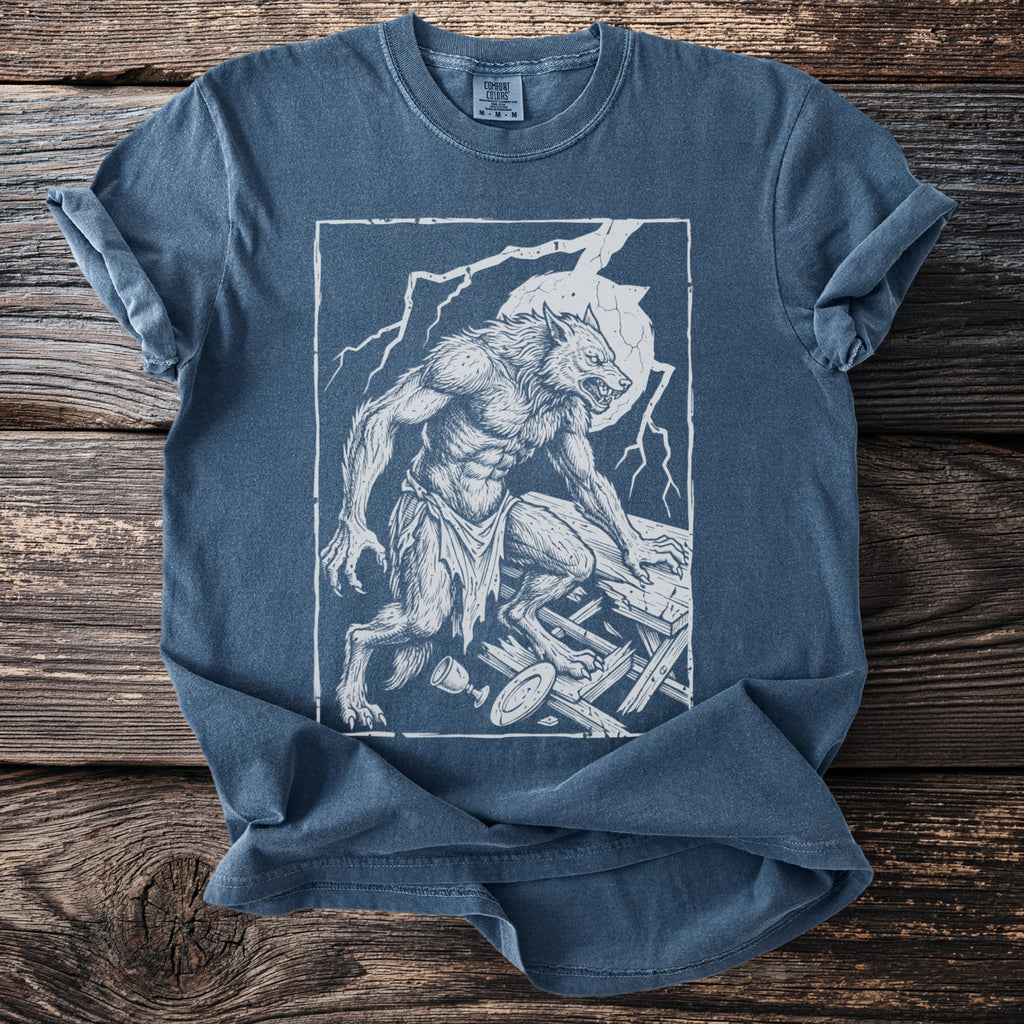 T-shirt with a white line drawing of a werewolf under a full moon and lightning.