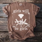 Brown t-shirt with "girls will be girls" and a praying mantis graphic.