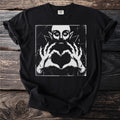 Black t-shirt with a vintage style vampire making a heart shape with its hands.