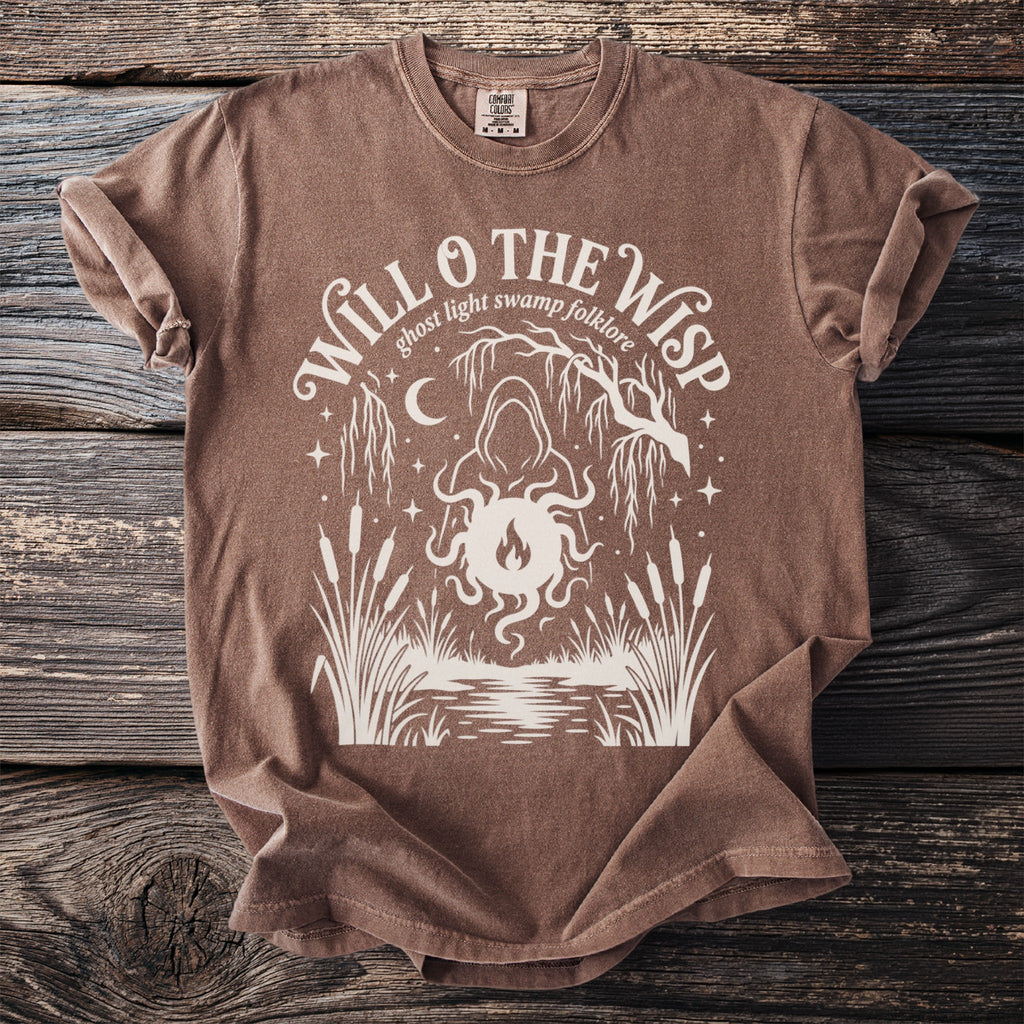 Brown t-shirt with "Will O The Wisp ghost light swamp folklore" graphic.