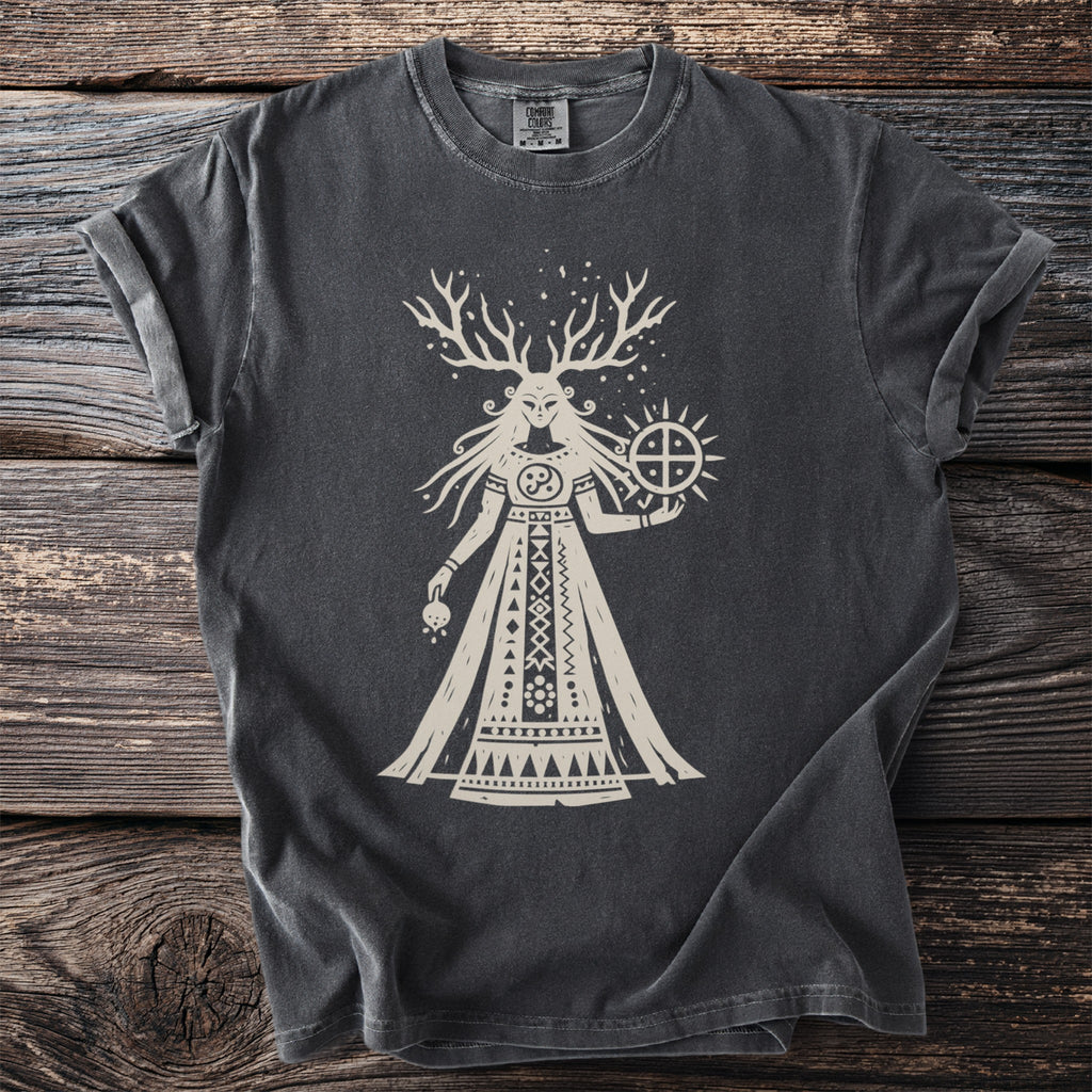 Dark gray t-shirt with a stylized cream graphic of a antlered female deity holding a sun symbol.