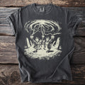 Dark gray t-shirt with a cream graphic of hooded figures holding lanterns under lightning bolts.