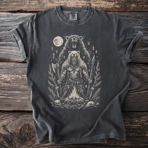 Dark t-shirt with a graphic of a bear warrior, axe, spear, moon, and runes.