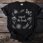 Black t-shirt with white floral elements, a bee, a butterfly, and the text "respect the locals".