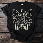 Black t-shirt with a cream-colored graphic of mythical creatures and fir trees.