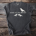 Dark grey t-shirt with white graphic of a single crow above text and three crows below.