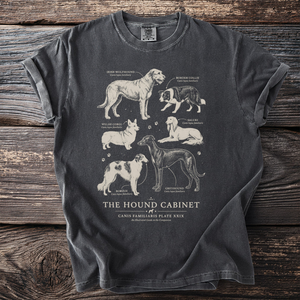 T-shirt with "The Hound Cabinet Canis Familiaris Plate XXIX" text and illustrations of six dog breeds.