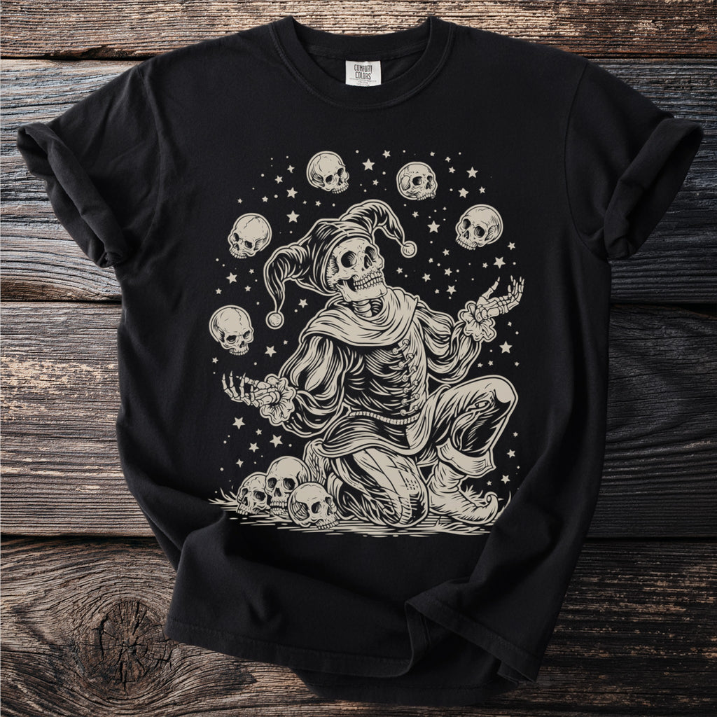Skeleton jester surrounded by skulls and stars on a black t-shirt.