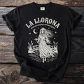 La Llorona Mexican weeping woman legend graphic on a black t-shirt.