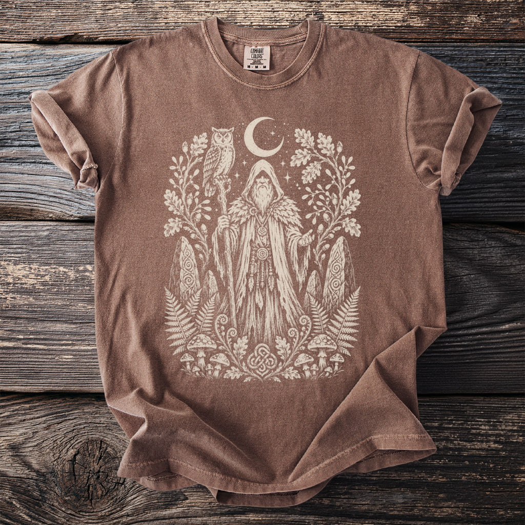 Brown t-shirt with a distressed print of a shaman in nature, an owl, and a moon.