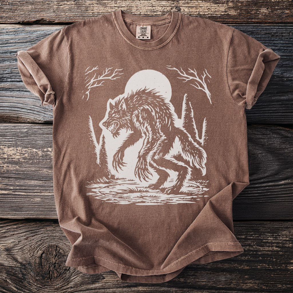 Brown t-shirt with white distressed werewolf graphic under a full moon.