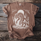 Brown t-shirt with white distressed werewolf graphic under a full moon.