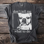 Dark t-shirt with a black and white graphic of a French bulldog, smoking a cigar and holding a coffee cup.
